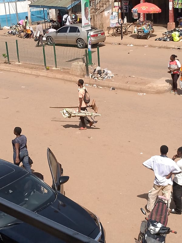 Morning street life and commerce documented in Bukuru, Nigeria