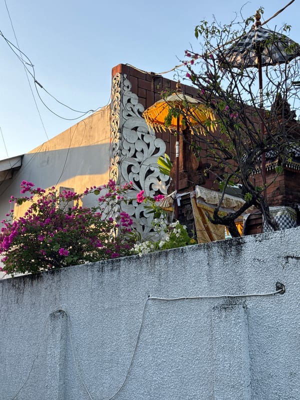 Evening life documented across Kuta beachside neighborhood