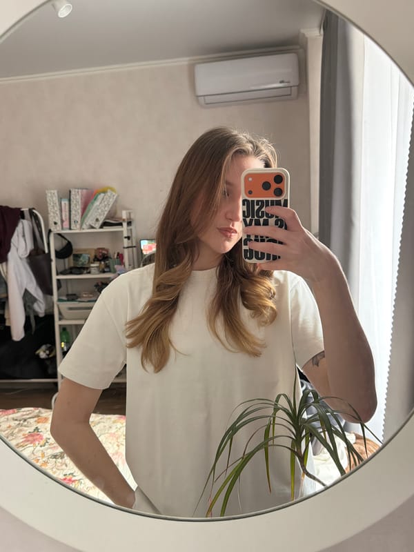 Woman takes selfies and casual photos indoors in Krasnodar