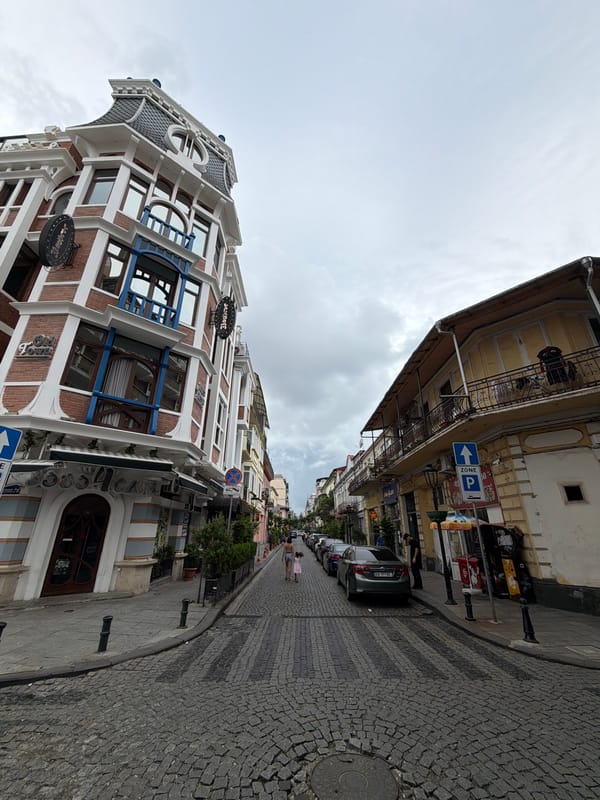 Historic cobblestone street in Batumi's old center, overcast morning