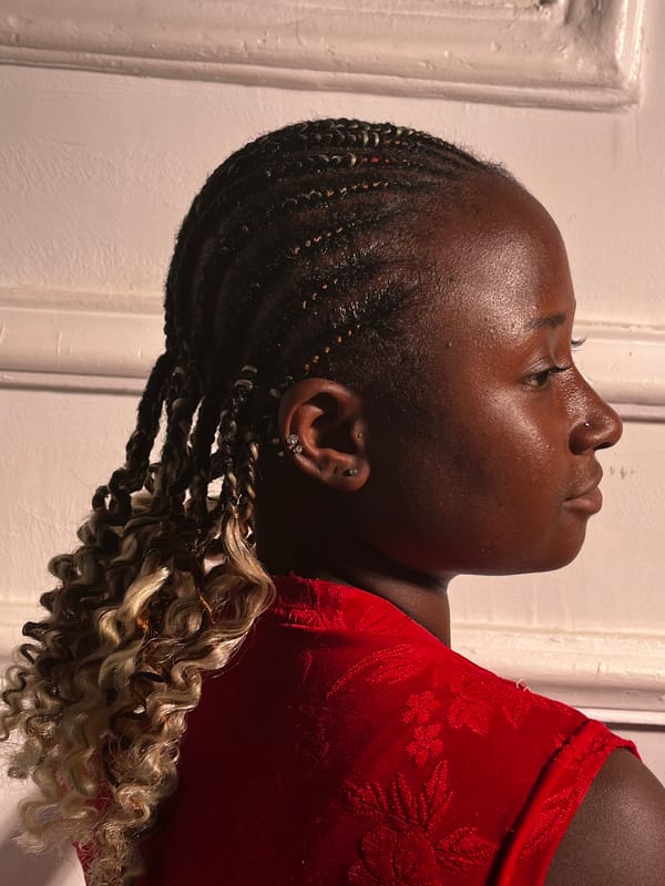Woman photographed in red dress during informal portrait session