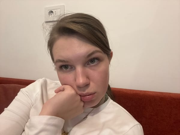 Woman enjoys sandwich meal in Belgrade suburb Friday evening