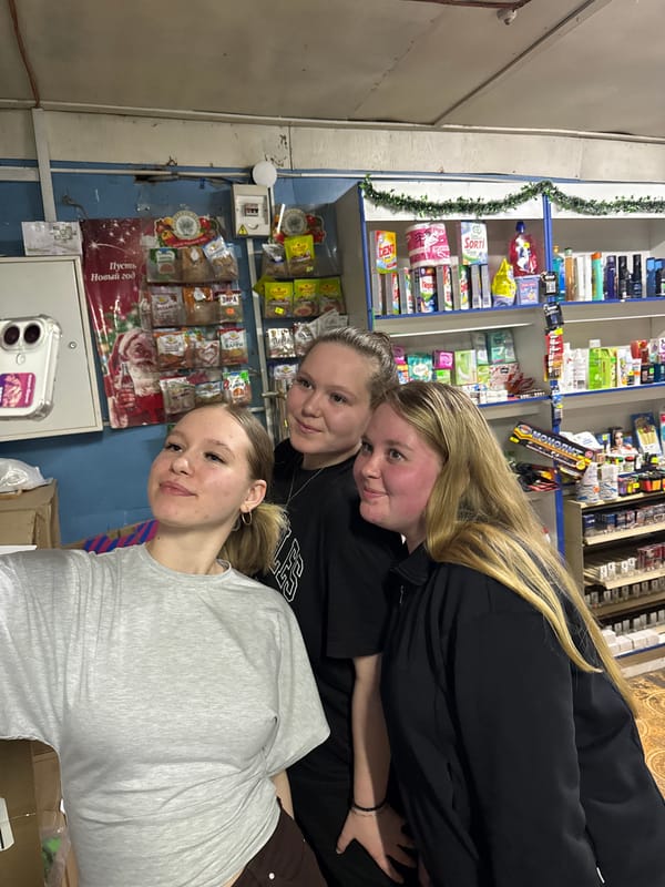 Two women document casual store visit in rural Russia