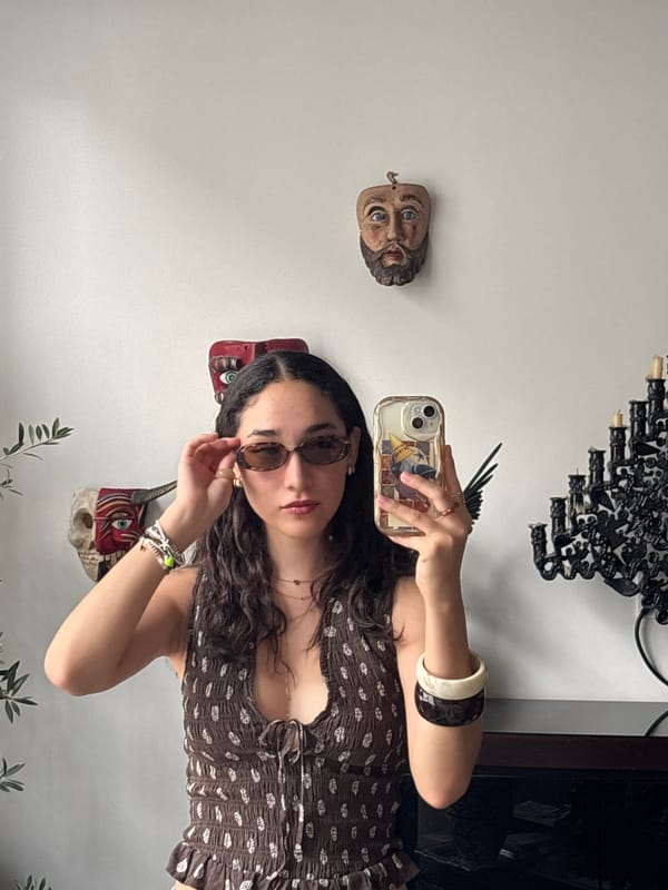 Woman takes selfie in Mexico City wearing jewelry
