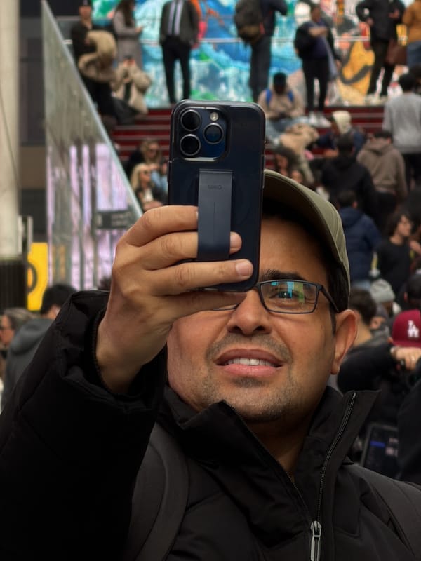 Breakdancers perform for crowds in busy Times Square evening