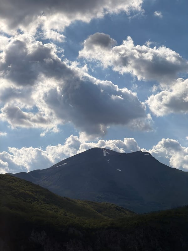 Mountainous landscape with blue water documented near Plužine, Montenegro