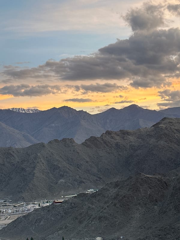 Shanti Stupa and Leh cityscape at dusk, multiple angles