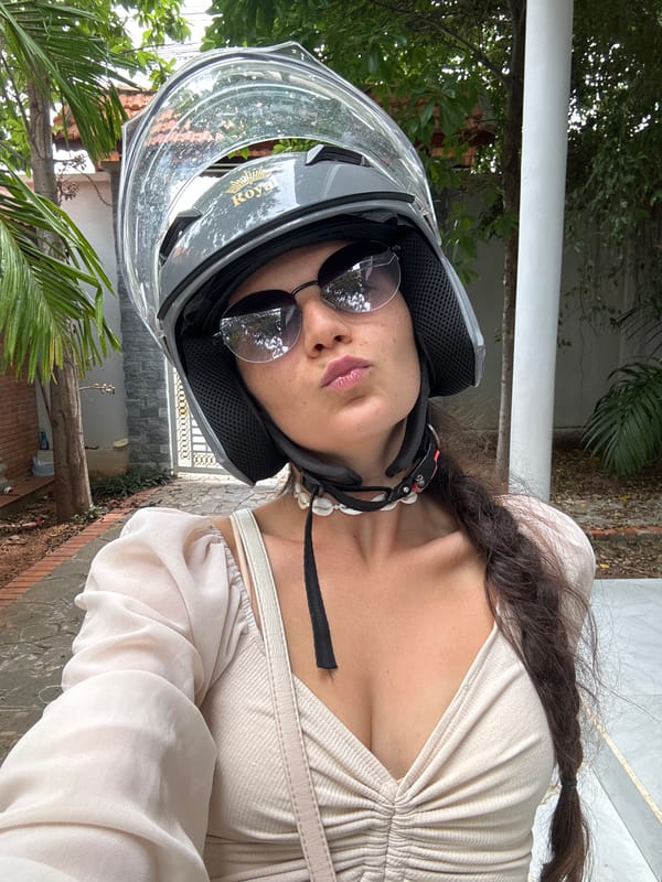 Helmet selfies on a Mũi Né ride, July 2026