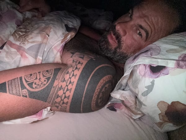 Sleeping man photographed in bed in Belgian town