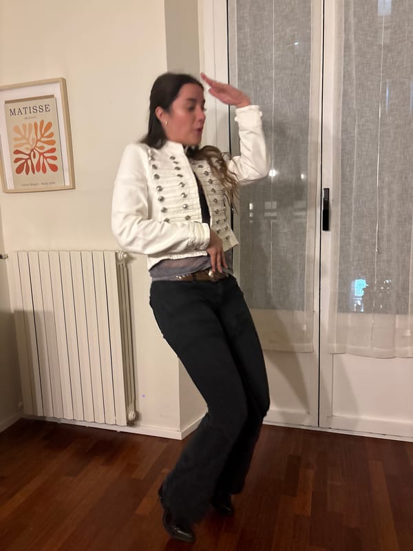 Person poses at window, tequila bottle spotted in Milan