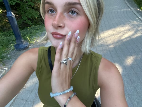 Back-to-back selfies in a Whistler park