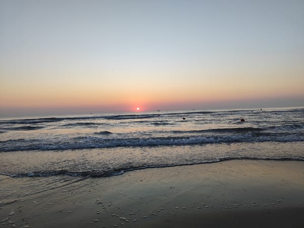 Sunrise breaking over the Adriatic at Rimini beach