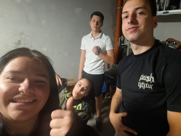 Five people captured in impromptu basement photograph