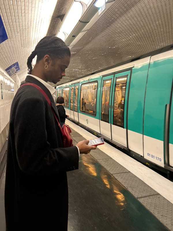 Black coat, red accessory trend spotted across Pantin
