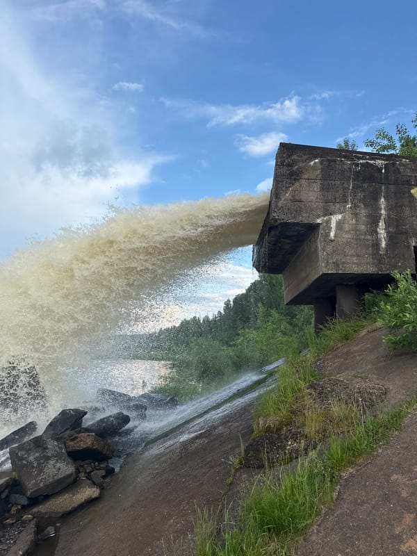 Water discharge and fishing activity near Chernushka, Russia
