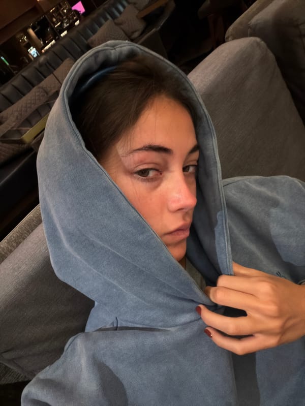 Person photographed relaxing on sofa in Mexico City home