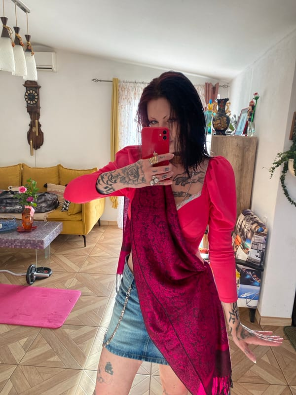 Woman takes mirror selfies in Kunje, Montenegro home