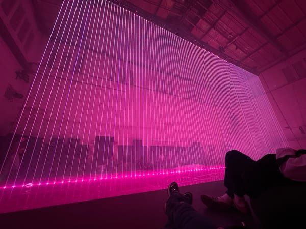 Pink laser art installation draws visitors in Berlin
