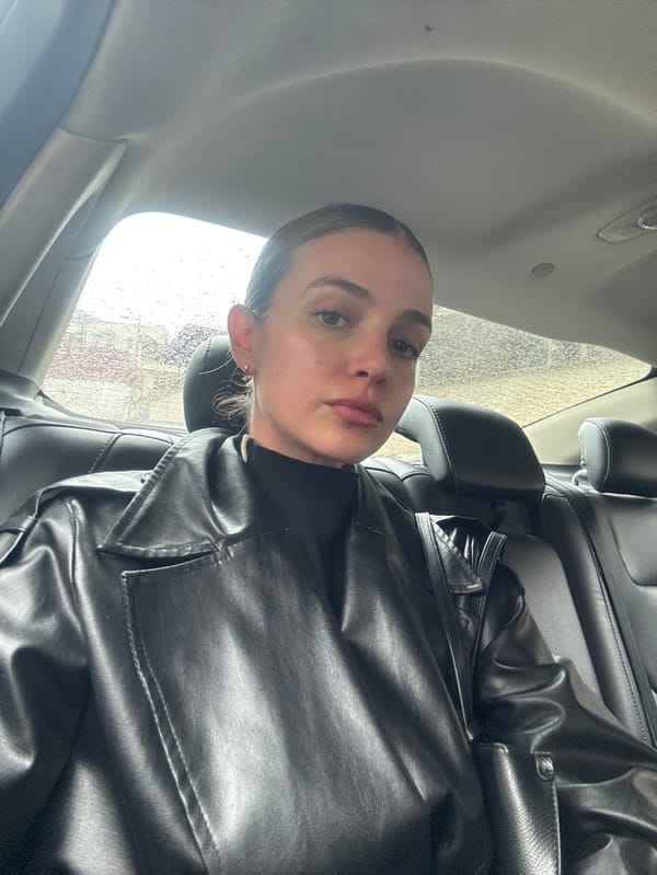 Woman documented in vehicle, elevator, hallway over two minutes