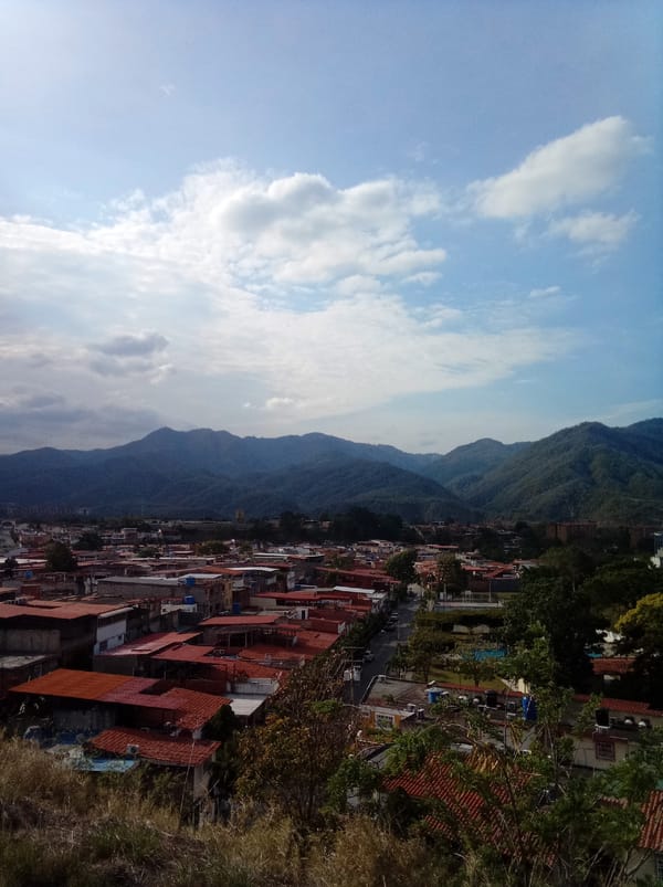 Tourist documents elevated views of Guatire residential area