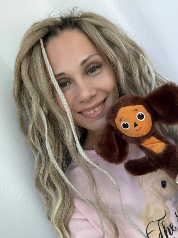 Woman poses with stuffed animal in Zavolzhye morning photo