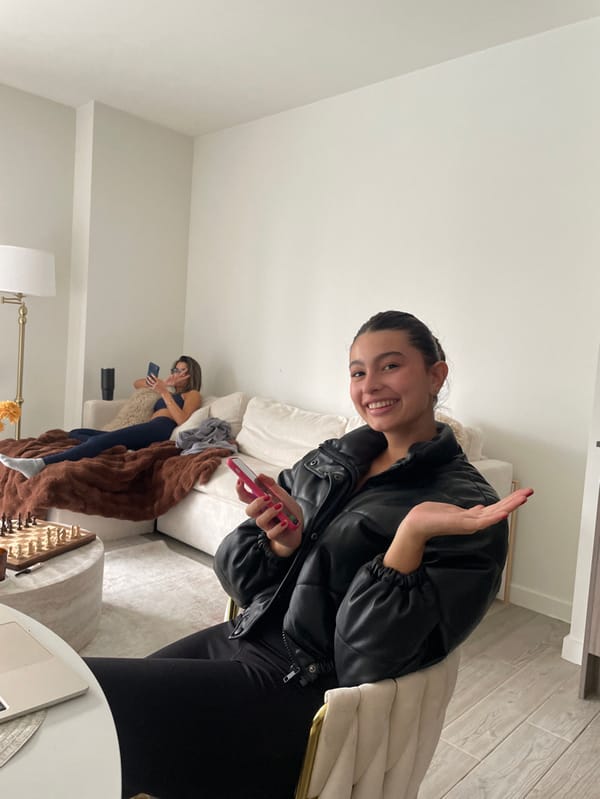 Women Take Selfies During Evening Hangout in Miami Apartment