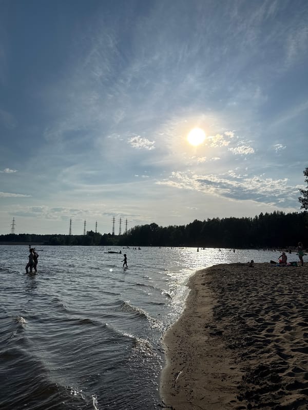 Windsurfing and beach relaxing on a Russian summer afternoon