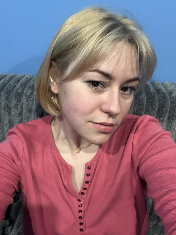 Young woman takes indoor selfie in Odesa, Ukraine