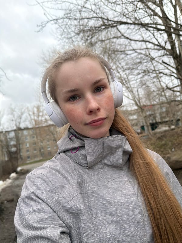 Woman takes winter selfies in Berezniki during snow melt