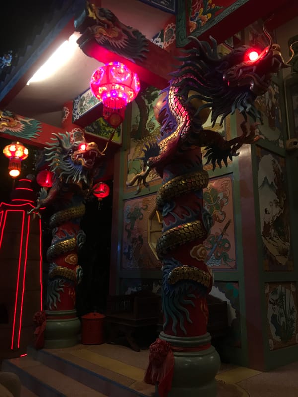 Tourist documents temple sites and lantern-lit streets in Thailand
