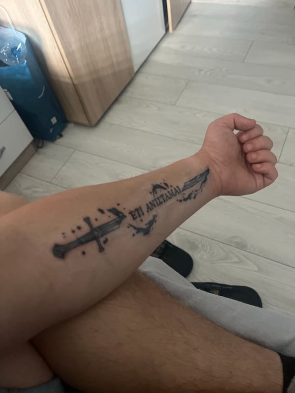 Person with tattoos photographed in Pazardzhik, Bulgaria