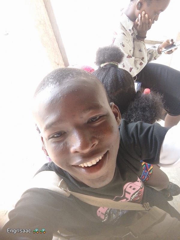 Young man takes smiling selfie in Ogbomosho, Nigeria