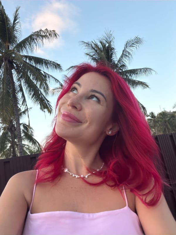 Kuta hotel morning: palm trees, a chic bathroom, and golden hour