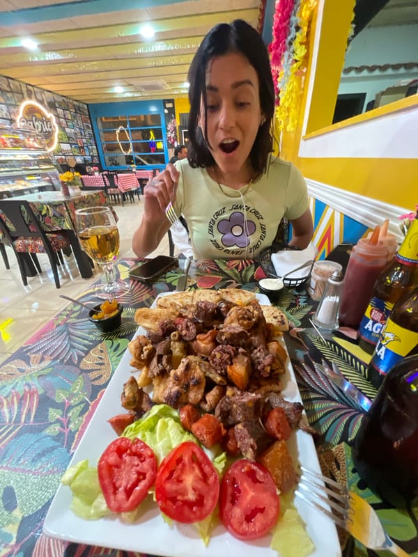 Woman documents dinner meal in L'Hospitalet de Llobregat