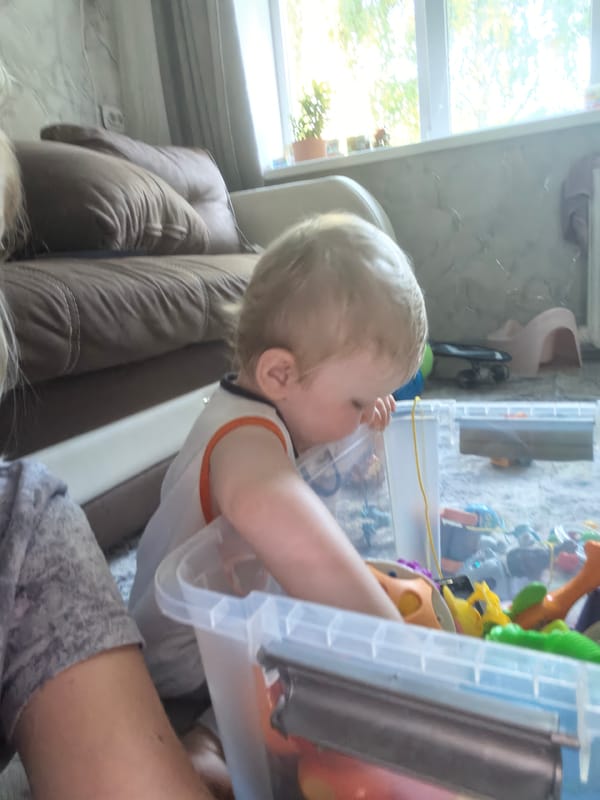 Indoor play session on the living room floor in Sterlitamak