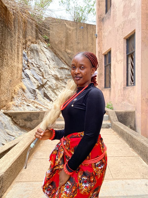 Women in traditional dress gather in Nigerian communities