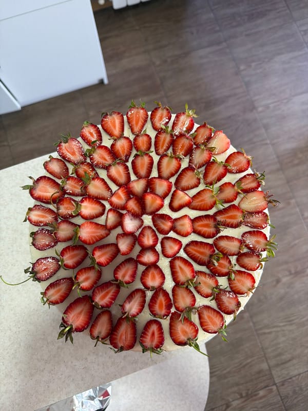 Strawberry cake photographed from multiple angles in Tbilisi