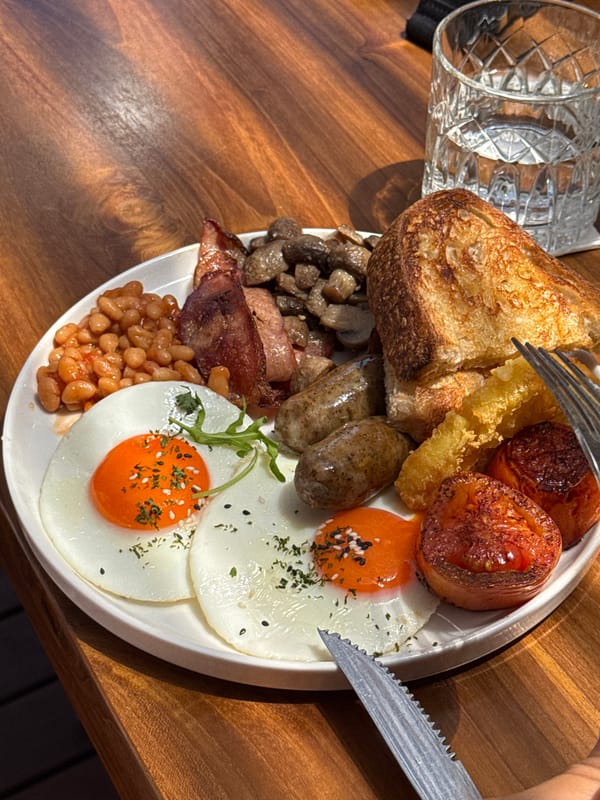 Morning breakfast documented at outdoor cafe in Kuta Selatan