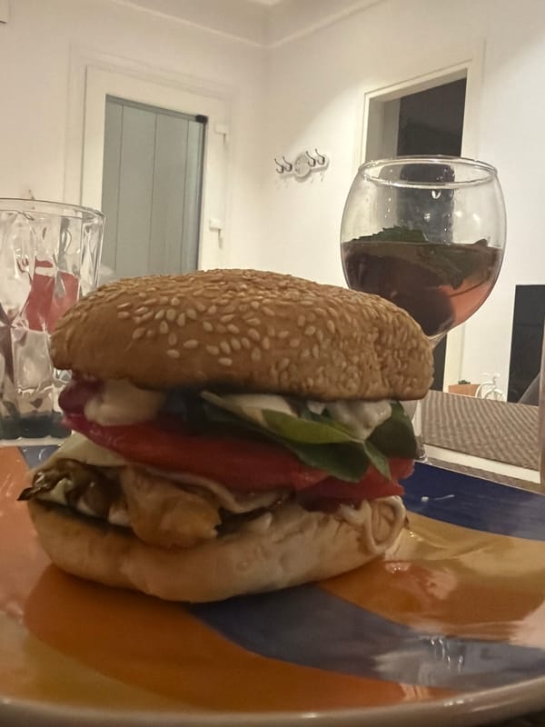 Olive groves at dusk, a burger, and a modern kitchen