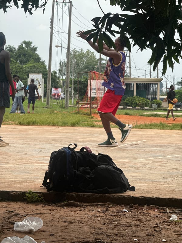 Afternoon pickup sports and street life in Amansee, Nigeria
