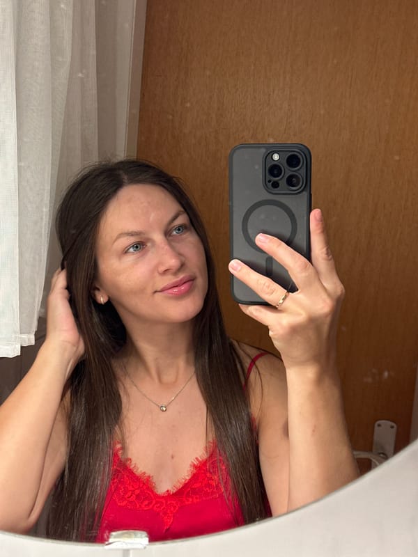 Woman takes mirror selfies in Fredenbeck, Germany