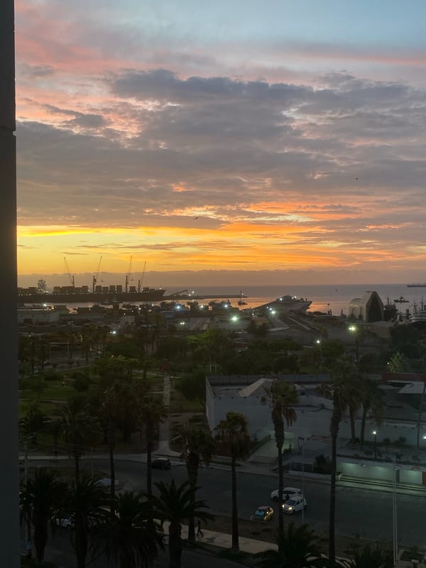 Colorful sunset captured over Arica, Chile from multiple viewpoints