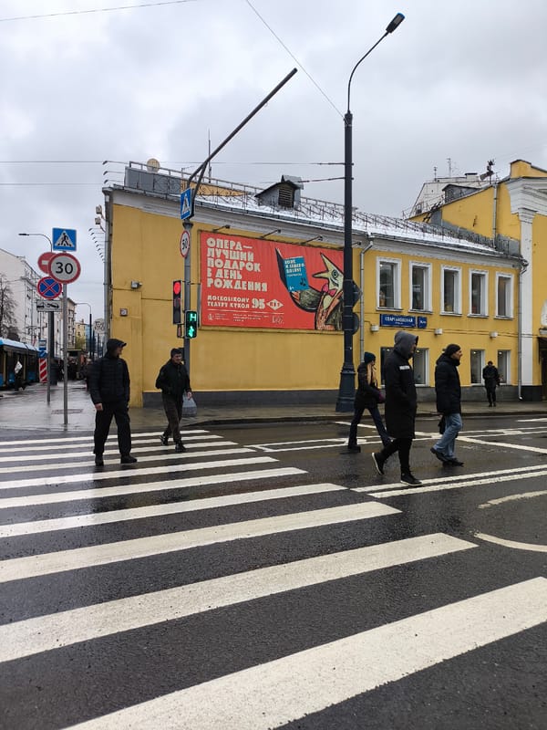 Rainy day street scenes documented across Moscow districts