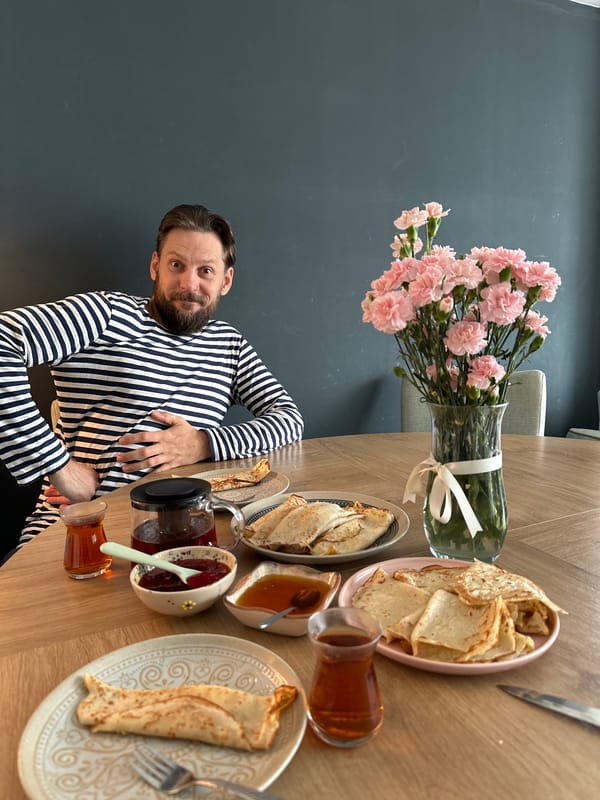 Woman prepares honey-lemon drink in Fethiye kitchen early morning