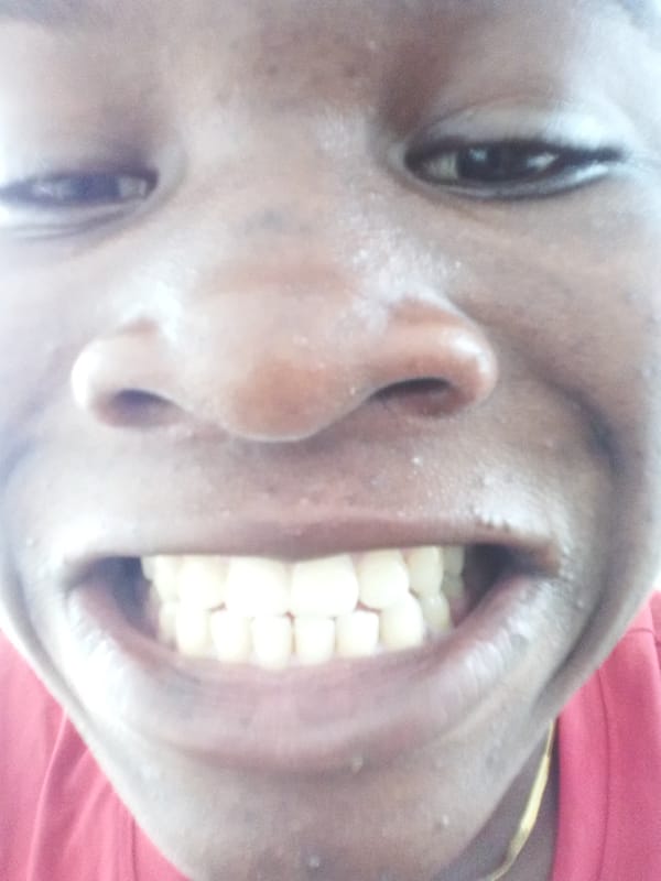 Person takes playful selfies in Owerri, Nigeria