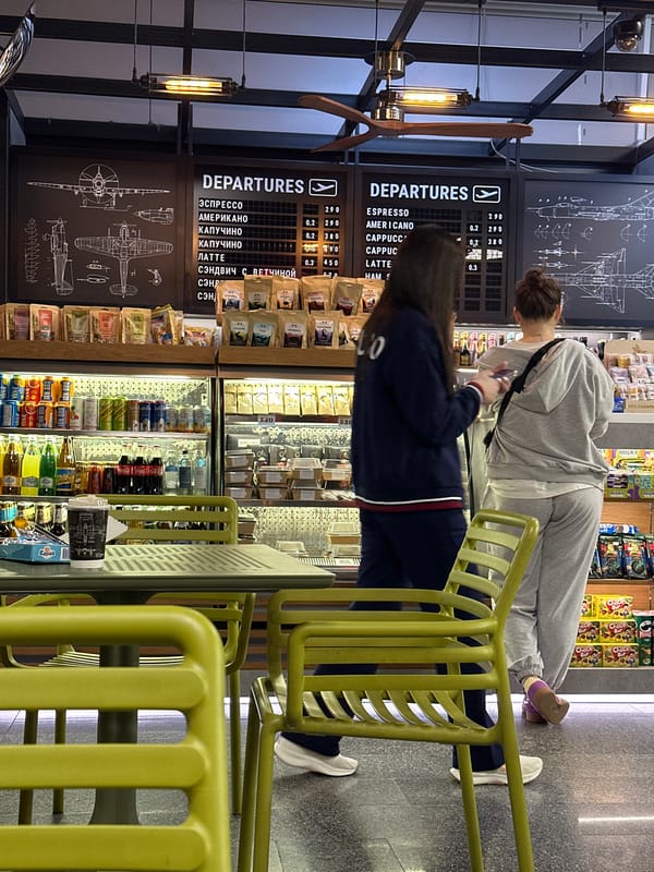 Airport café in Sochi displays bilingual coffee menu