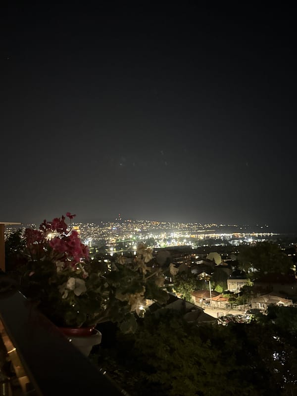Mixed personal feed: city nights, text graphics, and random snippets