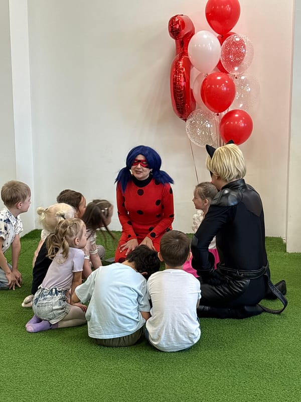 Children's birthday party features costumed characters in Krasnoyarsk