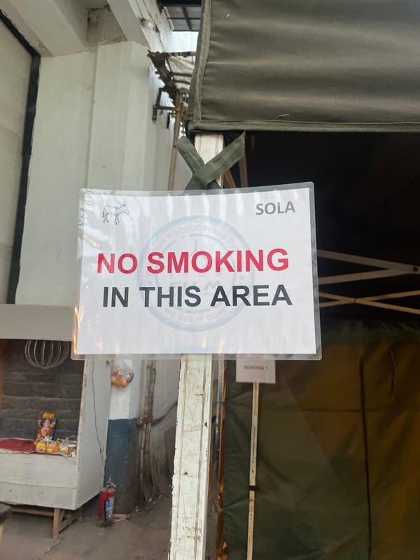 Mumbai street food stall signage and equipment documented