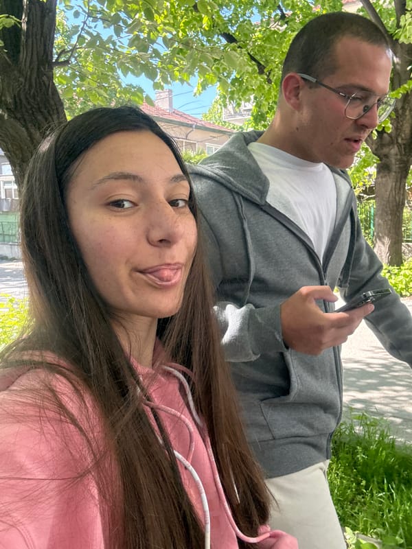 Woman takes selfies around Varna while dog walked nearby